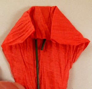 Folding petal sides toward center Folding petal sides toward center