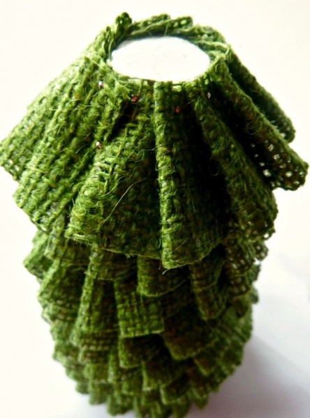 Top of burlap ribbon evergreen topiary 