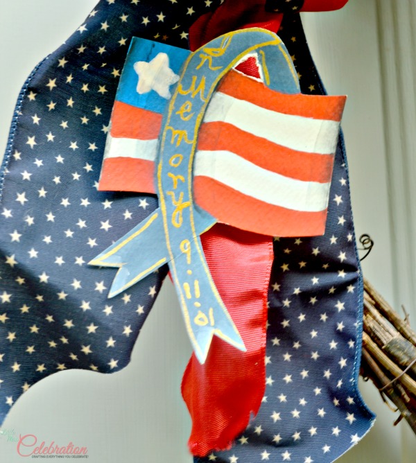 Flag pin in memory of 9/11 at Little Miss Celebration
