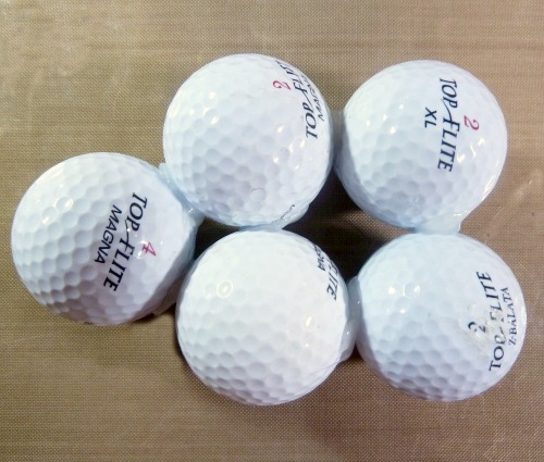 Five golf balls glued together