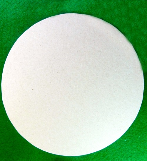 Chipboard on green felt