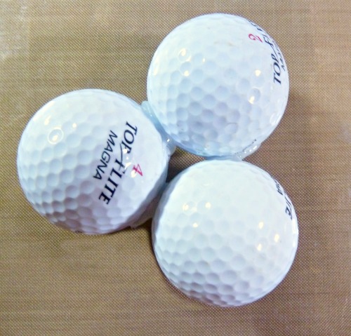 Hot gluing the first three golf balls