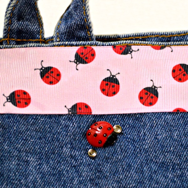 With a ready-made tote, some buttons, ribbon & crystals, it's easy to make a cute Ladybug Button & Bling Tote! At littlemisscelebration.com