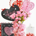 Painted laser cut hearts and pretty silk roses create a fast, Everlasting Valentine's Bouquet that brighten your home until spring! at littlemisscelebration.com