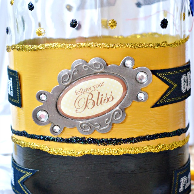 Celebrate the grad with a Mason Jar Grad Gift in their school colors! Fill with messages and $$ rolled & tied like diplomas. A fun gift! At littlemisscelebration