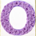 Add some Felt Flower Bloom Wall Art to a narrow wall! Individual canvases get painted and chipboard letters are decked with easy, felt flowers! at littlemisscelebration.com