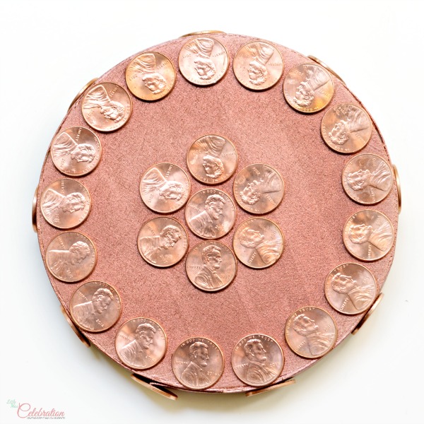Gather up a pile of shiny pennies and make a Penny Box for Dad! It's a fun place for him to stash his change and perfect for Father's Day! at littlemisscelebration.com