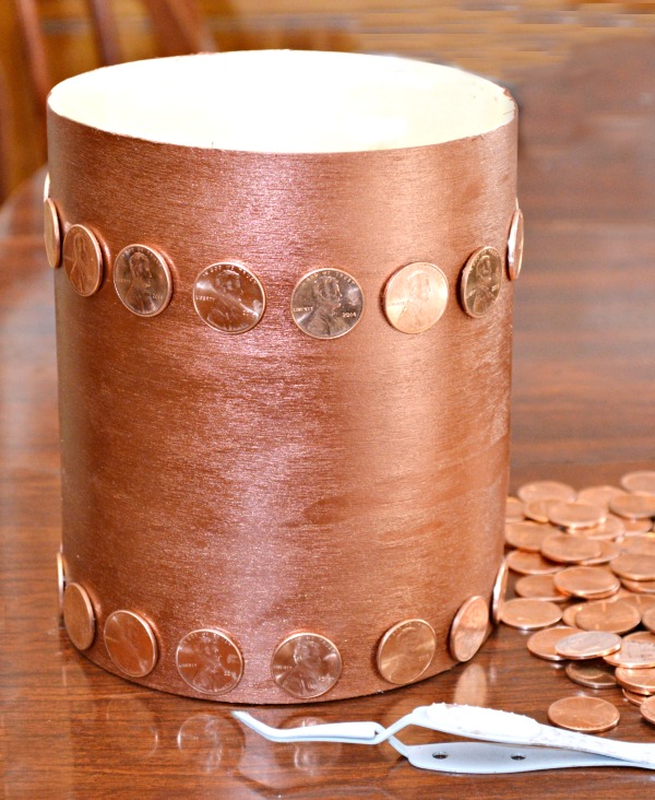 Gather up a pile of shiny pennies and make a Penny Box for Dad! It's a fun place for him to stash his change and perfect for Father's Day! at littlemisscelebration.com