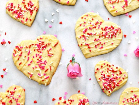 Tender and kissed with just the right touch of clementine sweetness, Clementine Butter Hearts pair with coffee, tea or chocolate. You can also use a cookie press! Recipe at littlemisscelebration.com