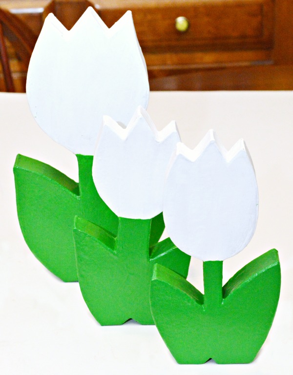 How CUTE are these forever tulips? It's easy to turn paper mache flowers into bright, sparkling charmers perfect for Mother's Day! at littlemisscelebration.com
