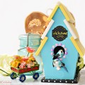 Bring a touch of the outdoors inside with a sunshine chic birdhouse! A cute, slat roof wood birdhouse gets painted in the colors of summer sun and sky, with garden touches. At littlemisscelebration.com