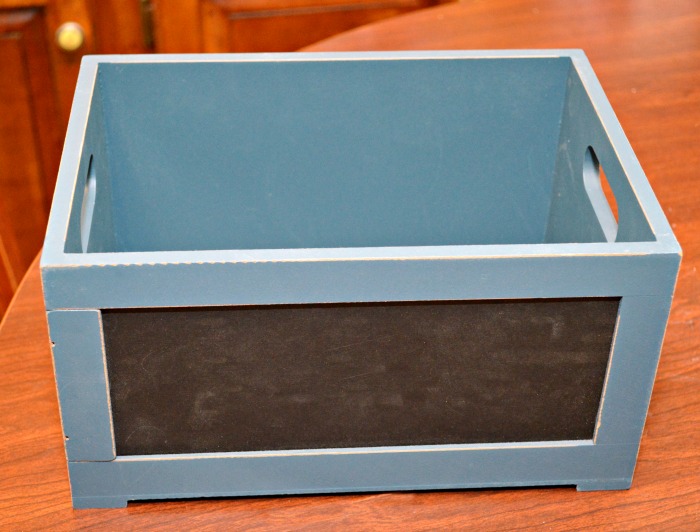 A small wooden crate that’s pre-painted with a chalkboard front makes it a snap to put together this Easy Snack Crate for Dad! Fill with his favorite munchies! at littlemisscelebration.com