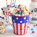 Make a batch of sweet-n-salty patriotic popcorn for your July 4th celebration! With crunch and texture, chocolate and vanilla, everyone will be eating this easy treat by the handful. Makes a great favor, too! At littlemisscelebration.com