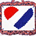 Fly the flag outside and this Love the USA Rosette Heart Art indoors! Fun & easy July 4th project! At littlemisscelebration.com