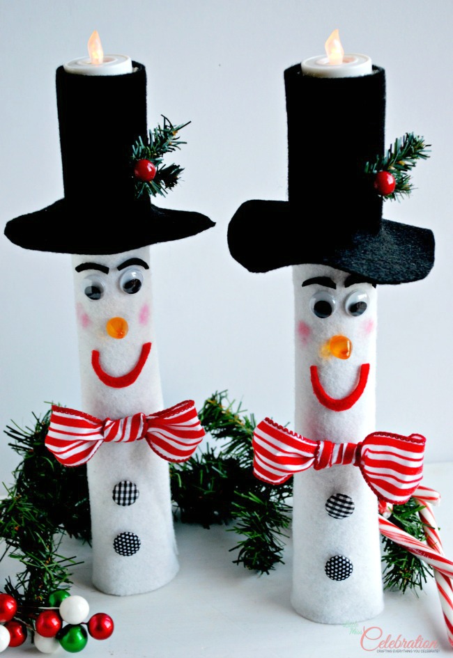 Wrapping Paper Roll Snowman Candles - a lot of charming, holiday impact for little $$. SO cute! 